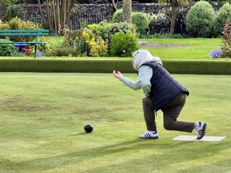 Member of Largs SWI playing bowls at Largs SWI Beer and Bowling Event in Largs Scotland